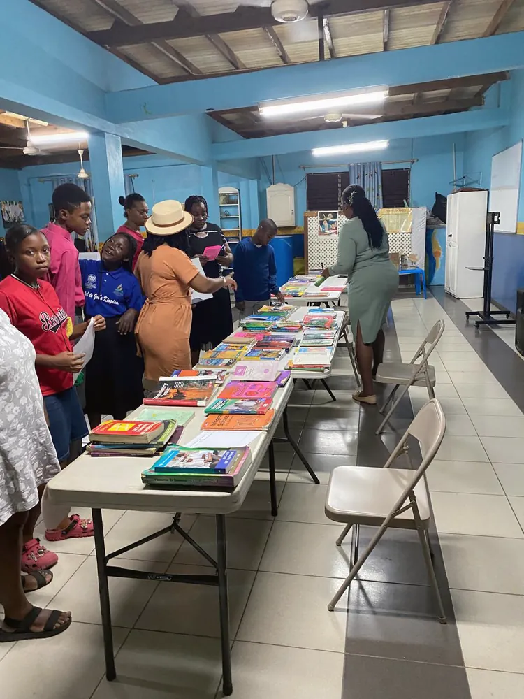 Tables of donated books ready for distribution