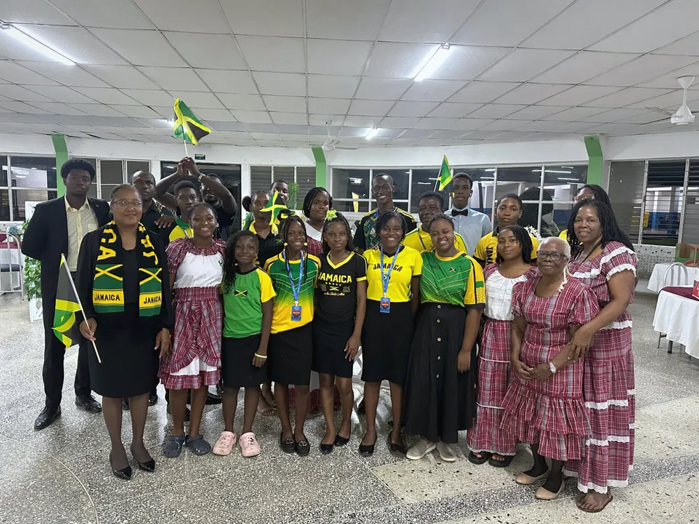 Missionaries in Jamaican national colours and traditional dress