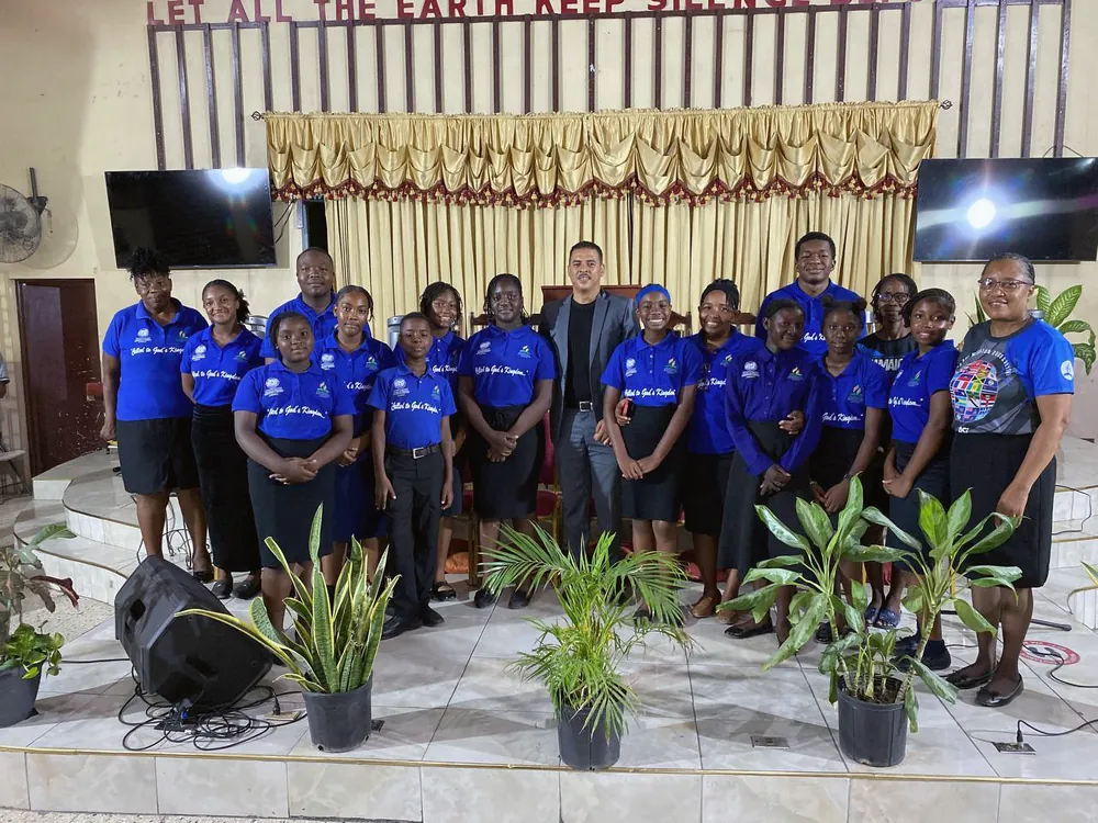 Penwood ASI missionaries together on the church platform