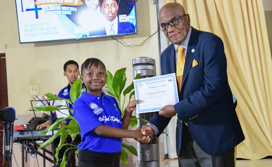 A missionary receives a certificate of induction