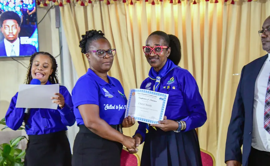 A missionary receives a certificate of induction