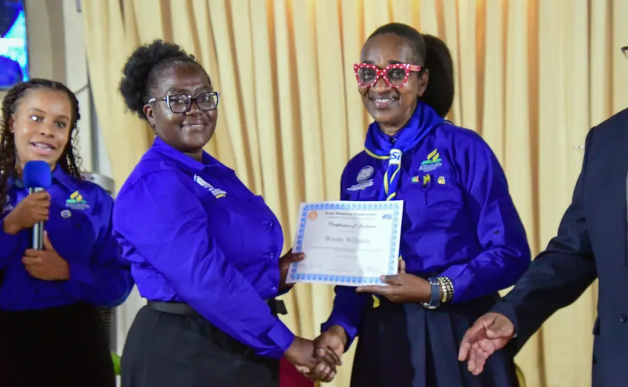 A missionary receives a certificate of induction