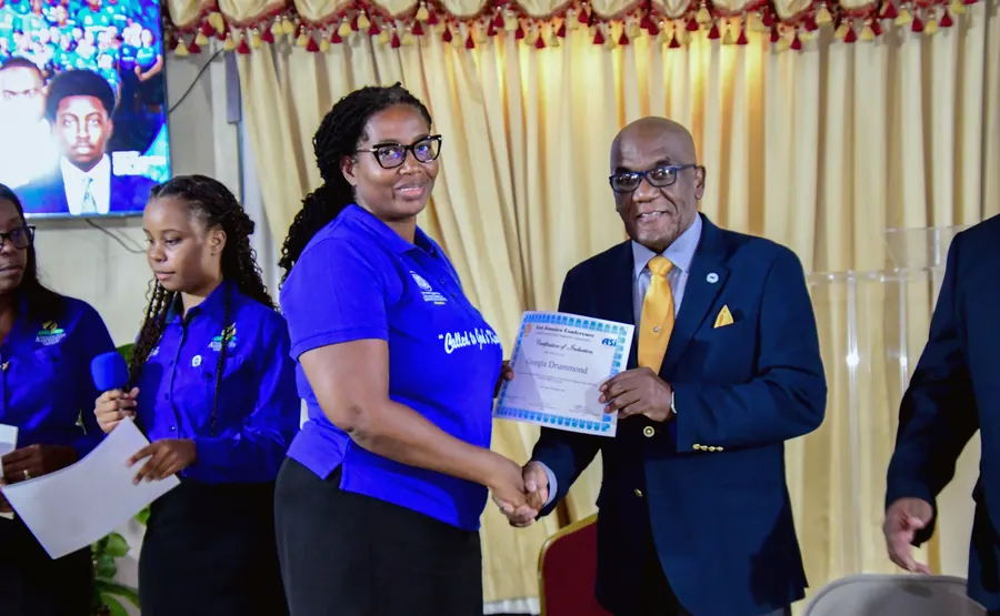 A missionary receives a certificate of induction