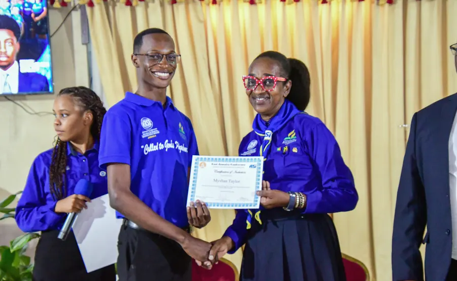 A missionary receives a certificate of induction