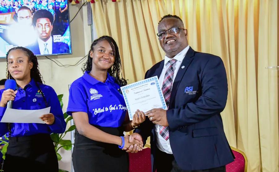 A missionary receives a certificate of induction
