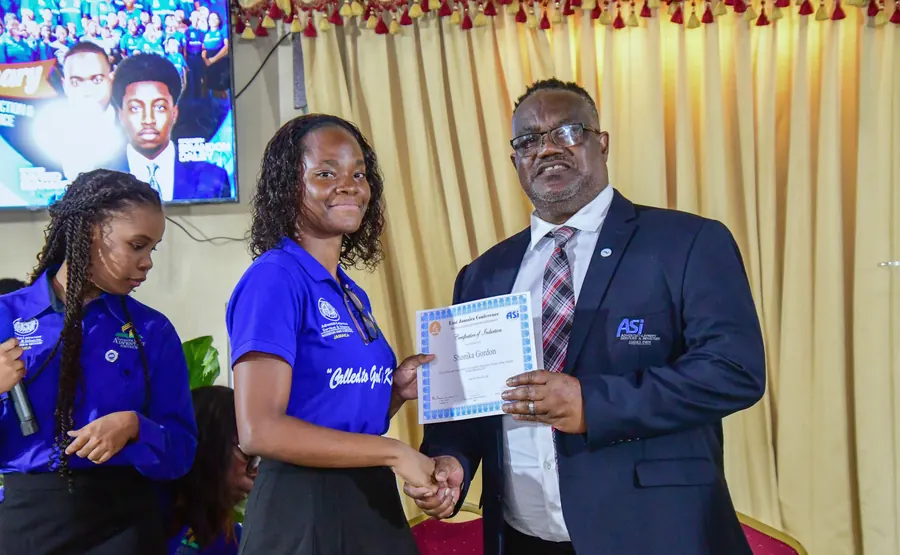 A missionary receives a certificate of induction