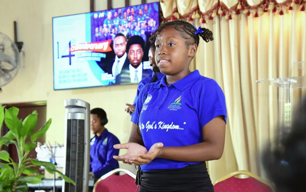A young missionary presenting with cupped hands