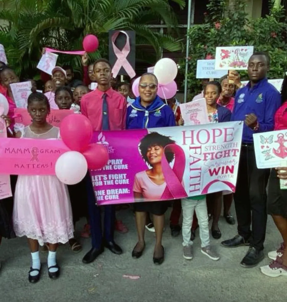 Marchers gathered with the awareness banner