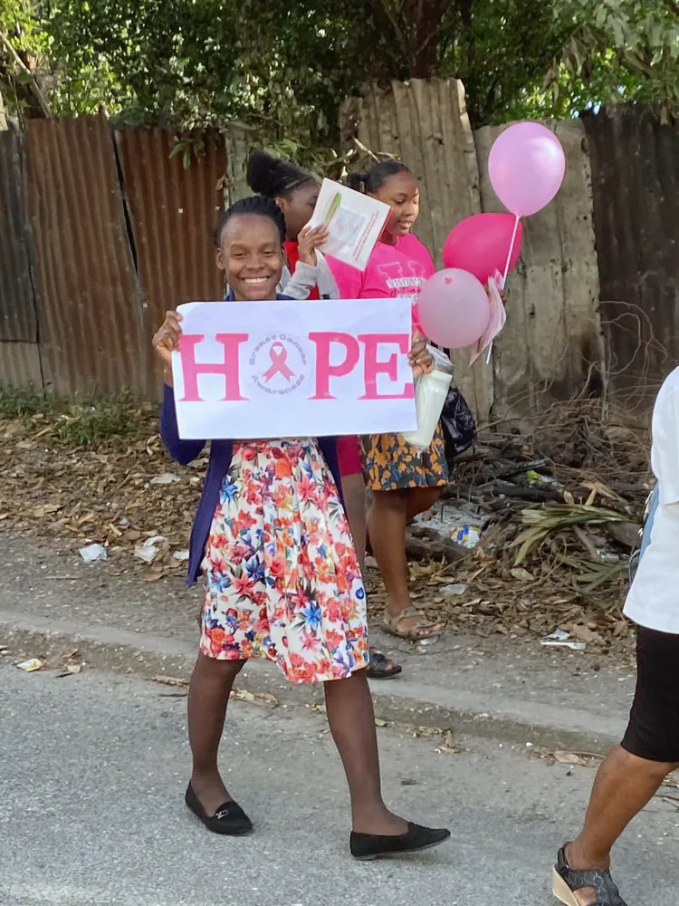 A marcher holding a HOPE sign